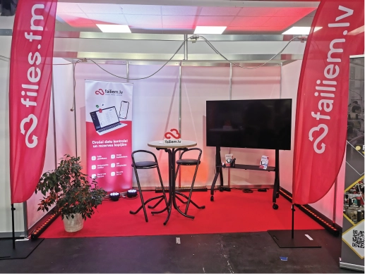 Failiem.lv stends ar ekrāniem un gaismām izstādē Tech Industry Ķīpsalā
